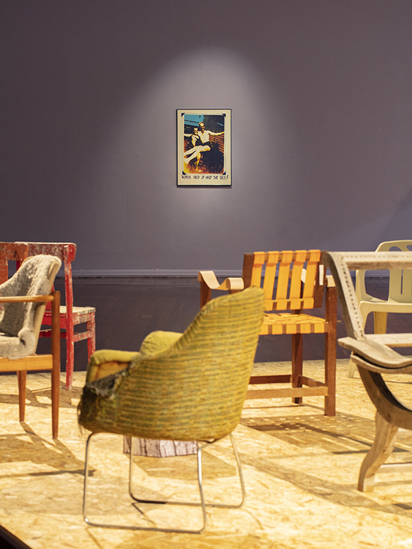 installation view: Agatha Gothe-Snape with Cruthers Collection of Women's Art - Trying to find comfort in an uncomfortable chair, Perth Institute of Contemporary Art, Perth, 2019, showing on platform: Agatha Gothe-Snape, Trying to find comfort in an uncomfortable chair, 2019; wall: Ann Newmarch, Women Hold Up Half the Sky, 1978