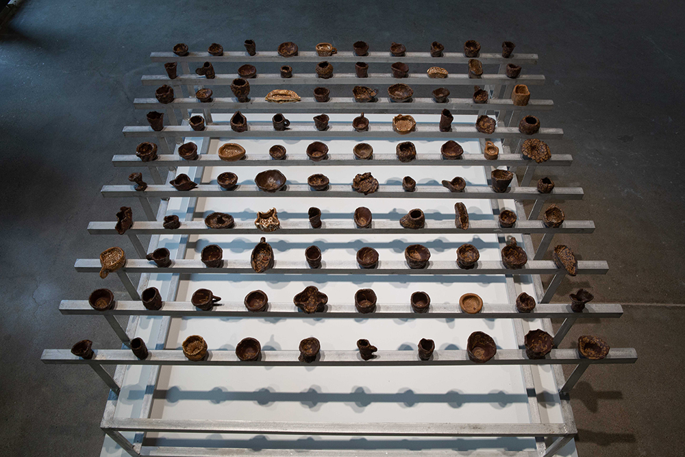 detail of pinch cups: Meishan Tudi red clay and Jingdezhen porcelain with Sichuan green tea wood ash glaze | Yasmin Smith - Flooded Rose Red Basin | Cosmopolis #1.5 - Enlarged Intelligence, Mao Jihong Arts Foundation, Chengdu, China