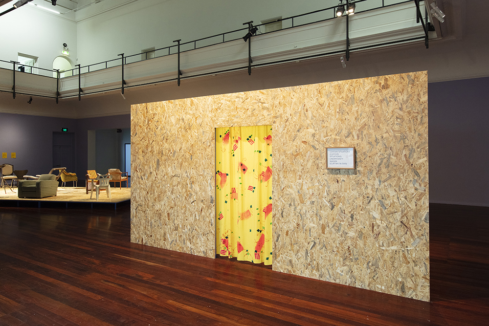 installation view: Agatha Gothe-Snape with Cruthers Collection of Women's Art- Trying to find comfort in an uncomfortable chair, Perth Institute of Contemporary Arts, Perth, 2019, showing foreground: Agatha Gothe-Snape, Certain Situations/EXPRESSION CURTAIN, 2013; background: Agatha Gothe-Snape, Trying to find comfort in an uncomfortable chair, 2019