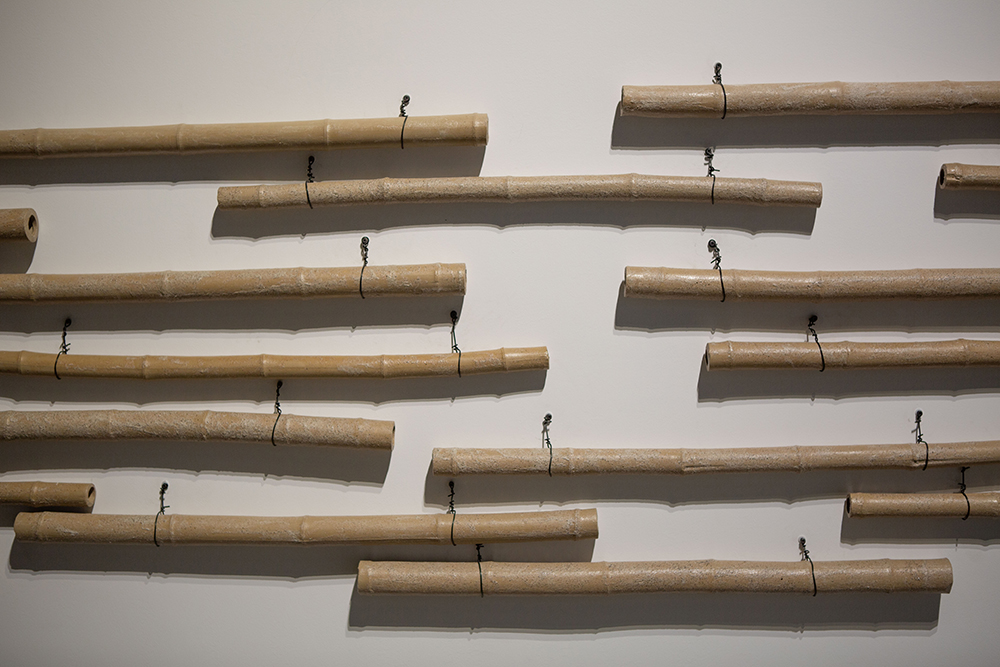 detail of ceramic bamboo poles: Yong Chuan slip with Jiajiang bamboo ash glaze | Yasmin Smith - Flooded Rose Red Basin | installation view Cosmopolis #1.5 - Enlarged Intelligence, Mao Jihong Arts Foundation, Chengdu, China