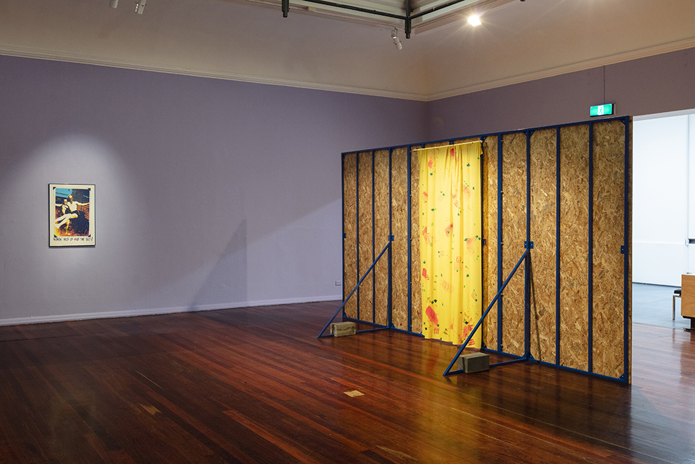 installation view: Agatha Gothe-Snape with Cruthers Collection of Women's Art - Trying to find comfort in an uncomfortable chair, Perth Institute of Contemporary Art, Perth, 2019, showing left to right: Ann Newmarch, Women Hold Up Half The Sky, 1978; Agatha Gothe-Snape, Certain Situations/EXPRESSION CURTAIN, 2013